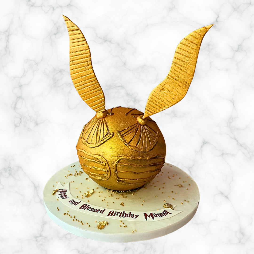Snitch Pinata Cake