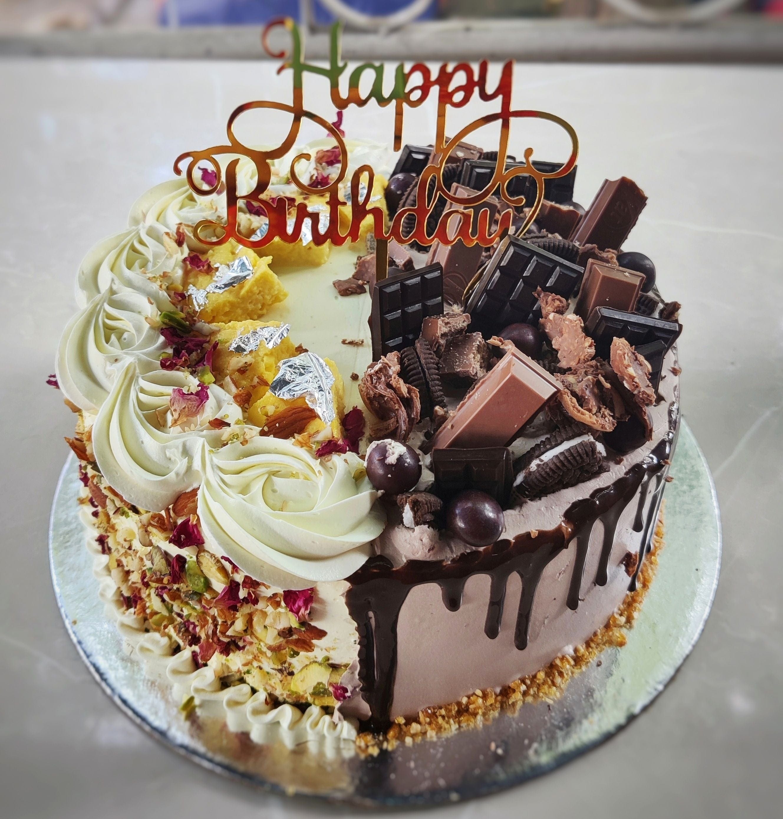 Premium Photo | Minimal birthday cake and decorated rainbow on top with  white cloth background. thai dessert